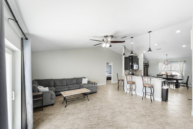 1566 SW Andalusia Rd, Port Saint Lucie, FL 34953 - living area featuring visible vents, light tile patterned flooring, recessed lighting, a ceiling fan, and vaulted ceiling