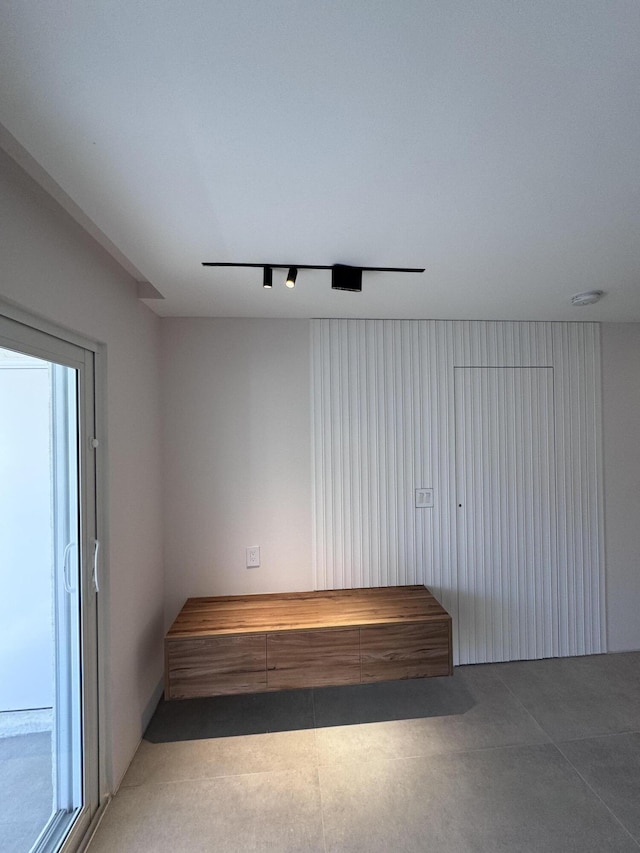 interior space featuring track lighting