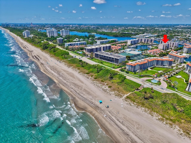 view of urban area featuring extended coastline