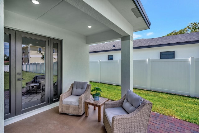 view of patio / terrace with fence and french doors