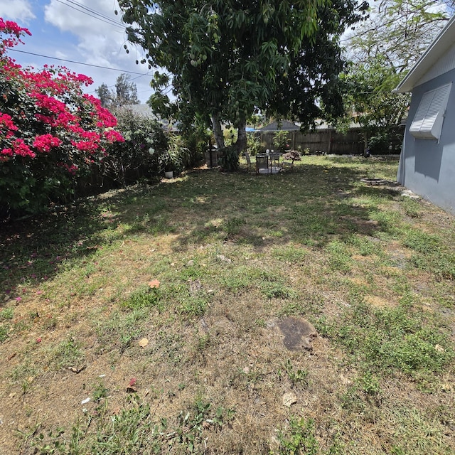 view of yard with fence