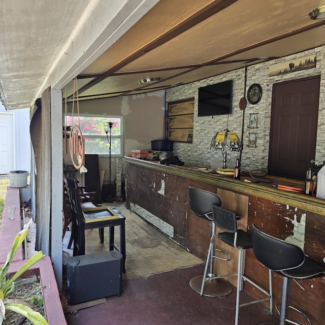 view of patio / terrace with an outdoor bar