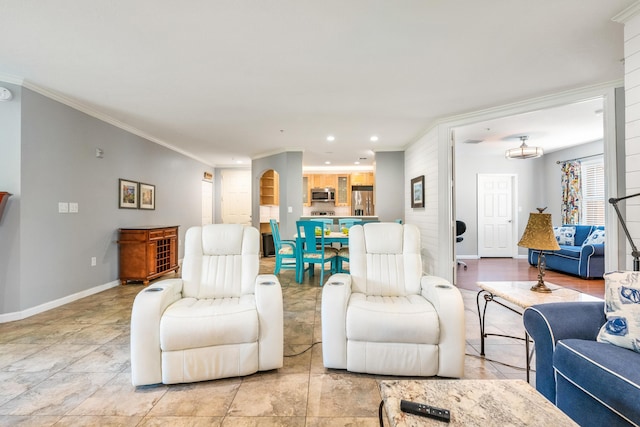 living area featuring ornamental molding, baseboards, and recessed lighting