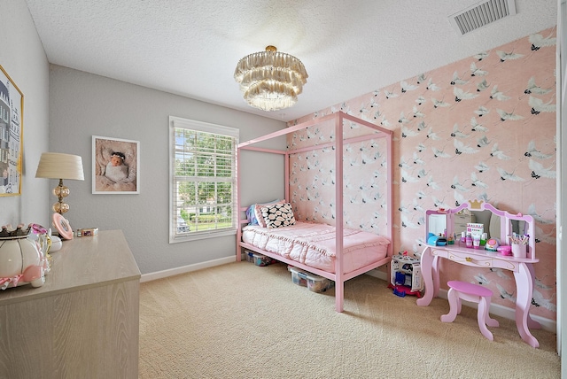 5769 SE Crooked Oak Ave, Hobe Sound, FL 33455 - carpeted bedroom featuring a chandelier, baseboards, and a textured ceiling