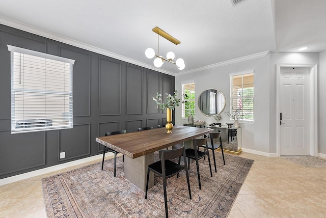 5769 SE Crooked Oak Ave, Hobe Sound, FL 33455 - dining room with ornamental molding, a chandelier, baseboards, light tile patterned floors, and a decorative wall