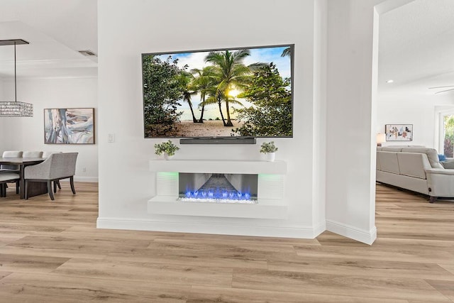 132 Steeple Cir, Jupiter, FL 33458 - living area with baseboards and wood finished floors