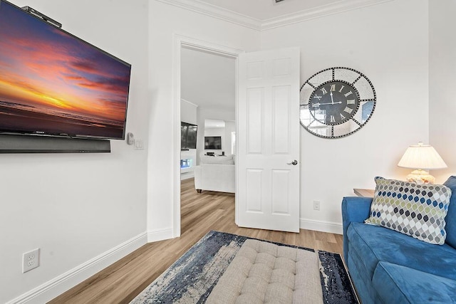 132 Steeple Cir, Jupiter, FL 33458 - living room with wood finished floors, baseboards, and crown molding