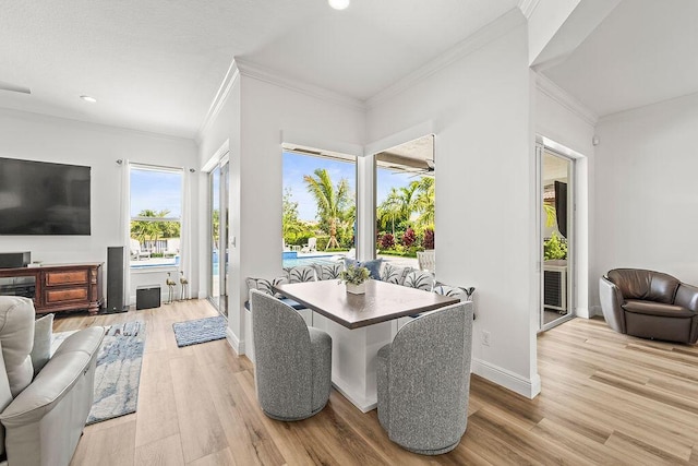 132 Steeple Cir, Jupiter, FL 33458 - dining room with light wood-style flooring, crown molding, recessed lighting, and baseboards