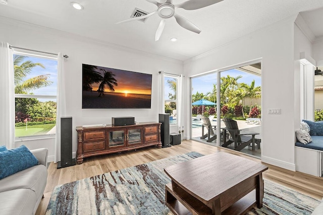 132 Steeple Cir, Jupiter, FL 33458 - living area with healthy amount of natural light, crown molding, a ceiling fan, light wood finished floors, and recessed lighting