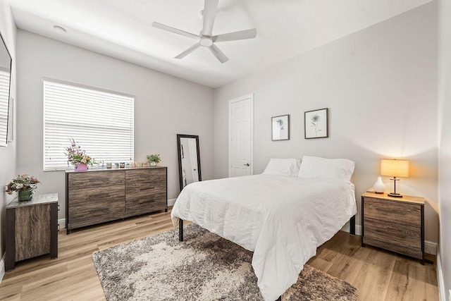 132 Steeple Cir, Jupiter, FL 33458 - bedroom with light wood-type flooring, baseboards, and ceiling fan