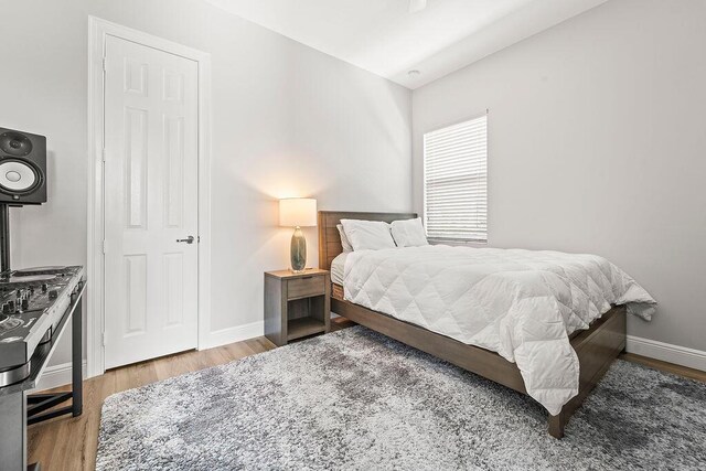 132 Steeple Cir, Jupiter, FL 33458 - bedroom with wood finished floors and baseboards
