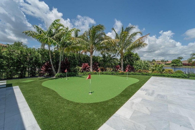 132 Steeple Cir, Jupiter, FL 33458 - view of property's community featuring a putting area, a patio, and a water view