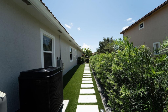 132 Steeple Cir, Jupiter, FL 33458 - view of yard with central air condition unit