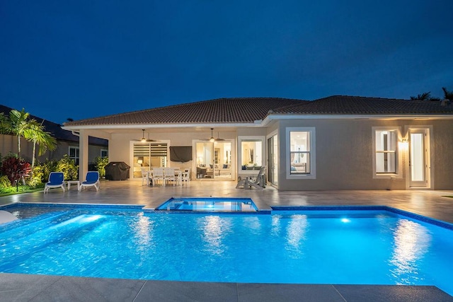 132 Steeple Cir, Jupiter, FL 33458 - view of swimming pool with a patio, a ceiling fan, and a pool with connected hot tub