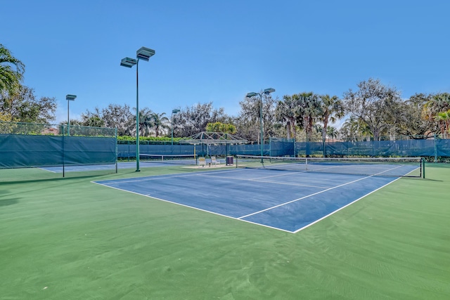 view of sport court with fence and community basketball court