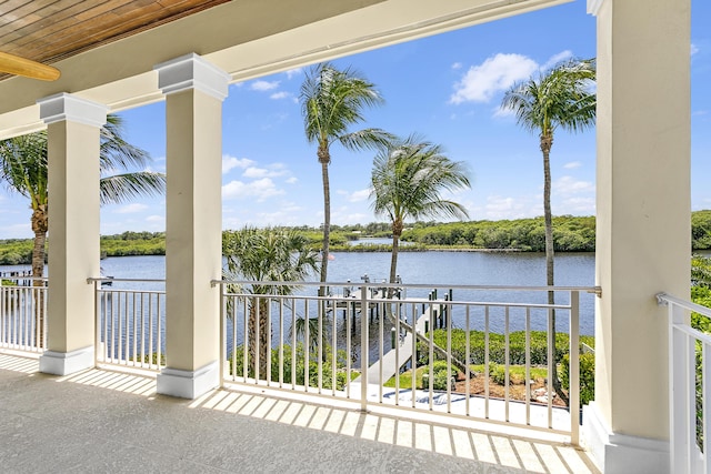 view of patio with a water view