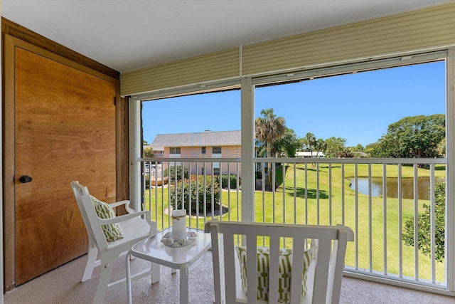 18081 SE Country Club Dr Unit 130, Jupiter, FL 33469 - sunroom / solarium with a water view and healthy amount of natural light