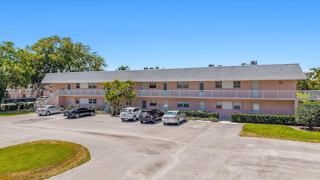 18081 SE Country Club Dr Unit 130, Jupiter, FL 33469 - view of property with uncovered parking