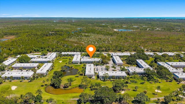 18081 SE Country Club Dr Unit 130, Jupiter, FL 33469 - bird's eye view of a golf club, a forest, a nearby body of water, and apartment complex