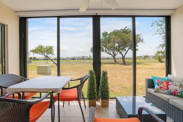 7240 Huntington Ln Unit 105, Delray Beach, FL 33446 - sunroom / solarium featuring ceiling fan and outdoor dining space