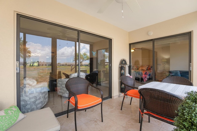 7240 Huntington Ln Unit 105, Delray Beach, FL 33446 - sunroom with a ceiling fan