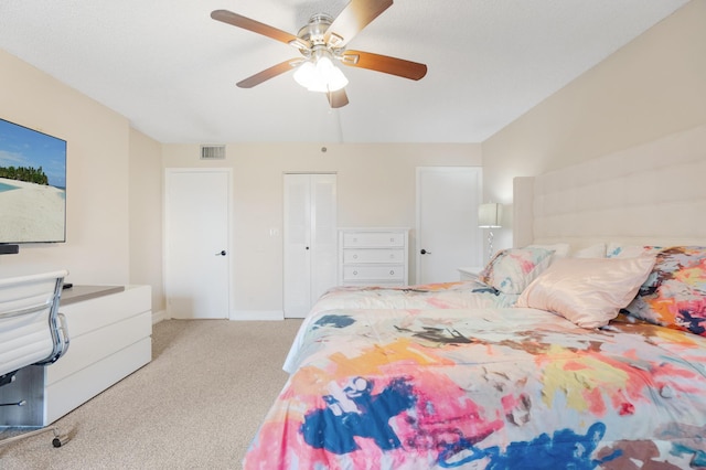 7240 Huntington Ln Unit 105, Delray Beach, FL 33446 - carpeted bedroom with baseboards, ceiling fan, a closet, and visible vents
