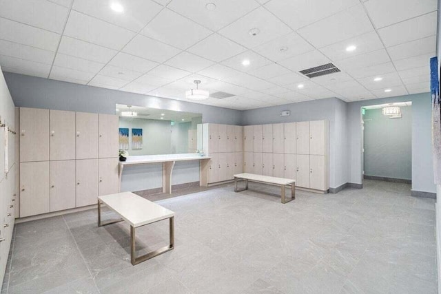 7240 Huntington Ln Unit 105, Delray Beach, FL 33446 - interior space with a paneled ceiling, baseboards, and visible vents