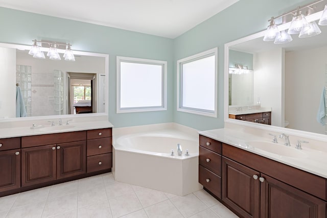 8005 SW Yachtsmans Dr, Stuart, FL 34997 - bathroom featuring tile patterned flooring, toilet, a tile shower, a garden tub, and two vanities