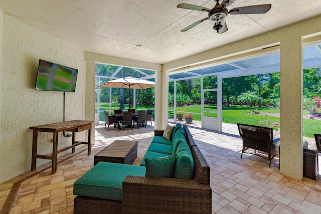 8005 SW Yachtsmans Dr, Stuart, FL 34997 - view of patio / terrace with outdoor lounge area, outdoor dining area, and a ceiling fan