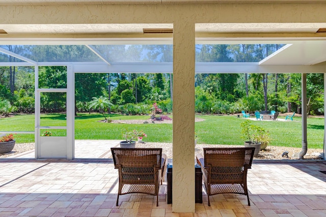 8005 SW Yachtsmans Dr, Stuart, FL 34997 - view of patio / terrace with glass enclosure and view of scattered trees