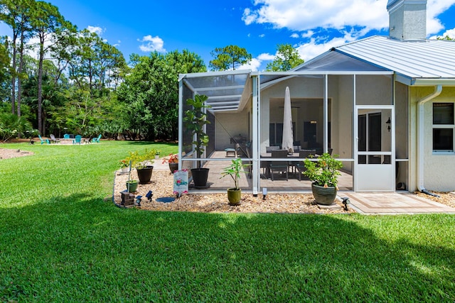 8005 SW Yachtsmans Dr, Stuart, FL 34997 - view of grassy yard with a patio