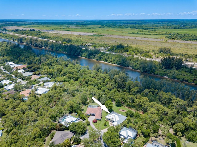 8005 SW Yachtsmans Dr, Stuart, FL 34997 - drone / aerial view of a large body of water and a forest