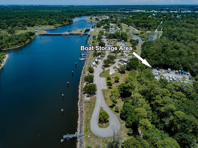 8005 SW Yachtsmans Dr, Stuart, FL 34997 - bird's eye view of a heavily wooded area and a nearby body of water