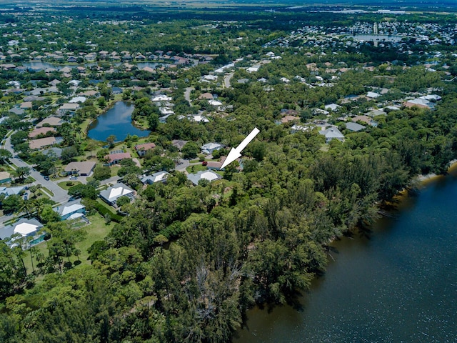 8005 SW Yachtsmans Dr, Stuart, FL 34997 - aerial view of property's location featuring a large body of water and nearby suburban area