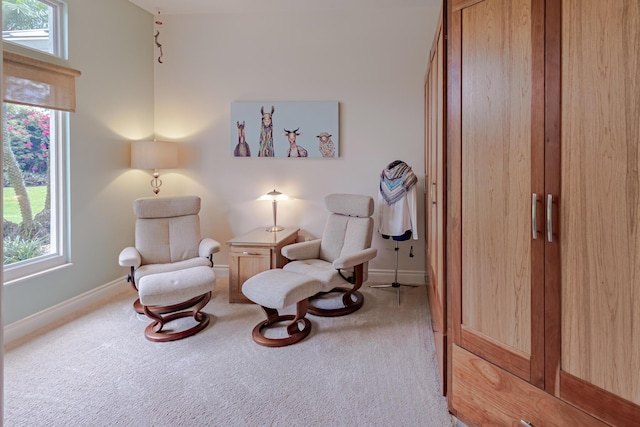 8005 SW Yachtsmans Dr, Stuart, FL 34997 - sitting room with carpet flooring, plenty of natural light, and baseboards