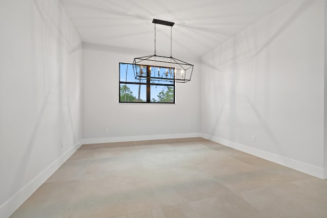 17816 86th St N, The Acreage, FL 33470 - unfurnished dining area with baseboards and a chandelier