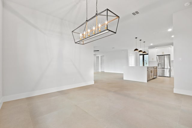 17816 86th St N, The Acreage, FL 33470 - unfurnished dining area featuring visible vents, baseboards, recessed lighting, a chandelier, and a sink