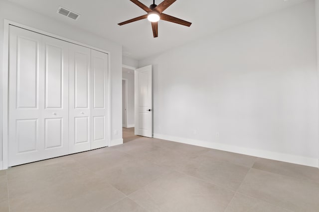 17816 86th St N, The Acreage, FL 33470 - unfurnished bedroom with visible vents, a ceiling fan, baseboards, and a closet