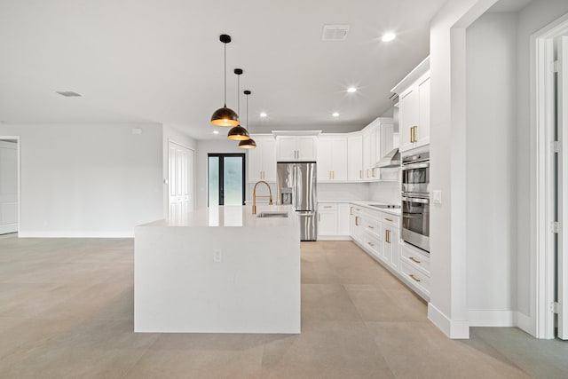 17816 86th St N, The Acreage, FL 33470 - kitchen featuring a kitchen island with sink, visible vents, light countertops, stainless steel appliances, and recessed lighting