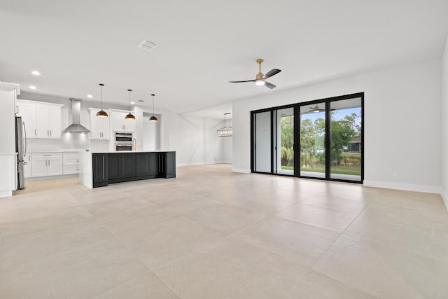 17816 86th St N, The Acreage, FL 33470 - unfurnished living room with recessed lighting, baseboards, visible vents, and ceiling fan