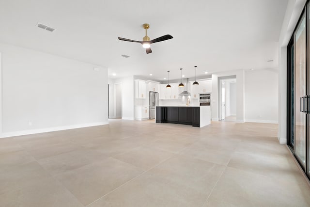 17816 86th St N, The Acreage, FL 33470 - unfurnished living room featuring baseboards, a ceiling fan, recessed lighting, and visible vents