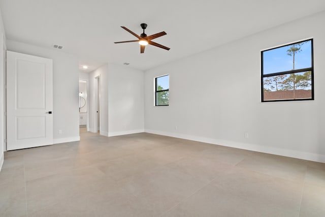 17816 86th St N, The Acreage, FL 33470 - unfurnished room featuring visible vents, a ceiling fan, baseboards, and light tile patterned flooring