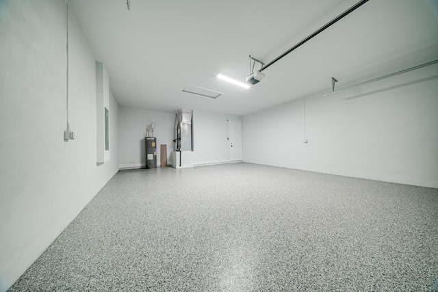 17816 86th St N, The Acreage, FL 33470 - garage with a garage door opener and electric water heater