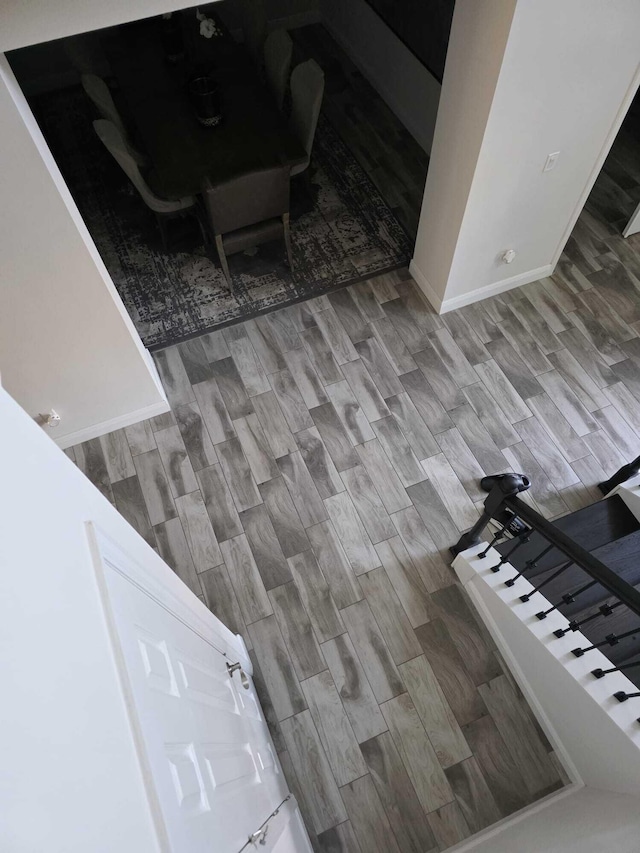 details with baseboards and wood finished floors