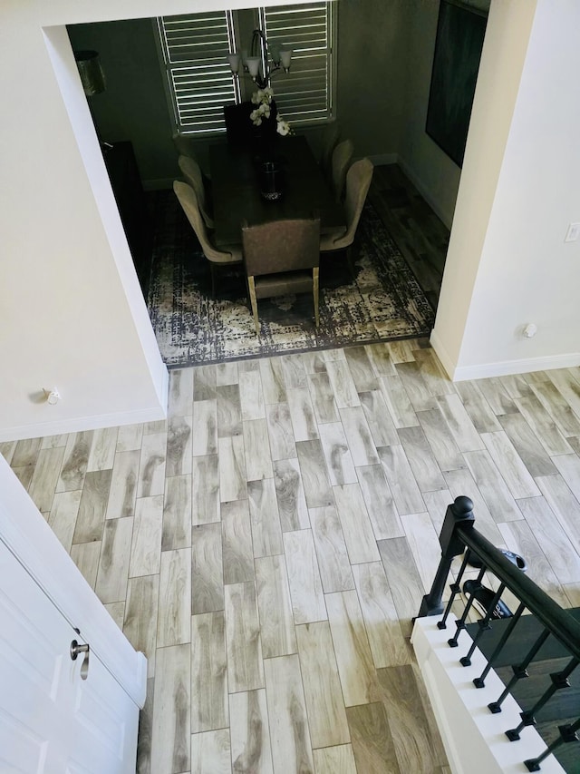 details with baseboards and wood finished floors