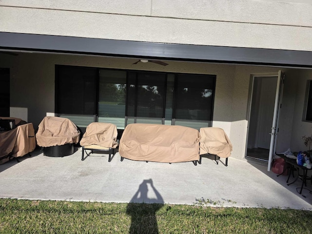 view of patio featuring a ceiling fan