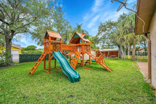 view of play area featuring a yard and a fenced backyard