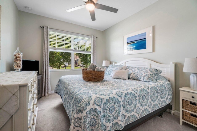 1220 Haywagon Trl, The Acreage, FL 33470 - bedroom featuring light colored carpet, baseboards, and a ceiling fan