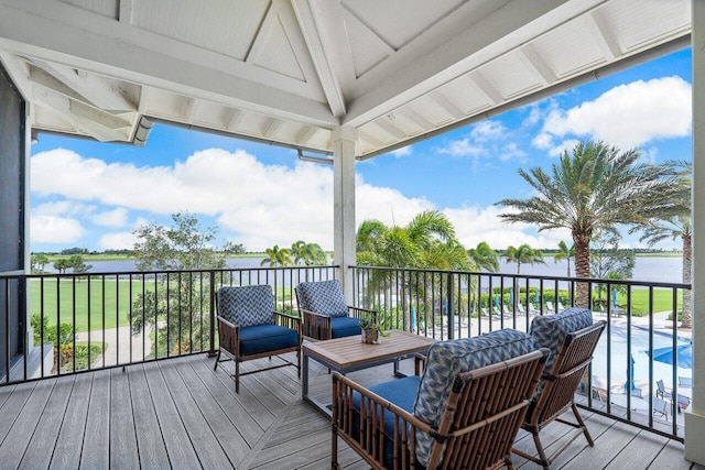 1220 Haywagon Trl, The Acreage, FL 33470 - wooden deck featuring a water view and an outdoor pool