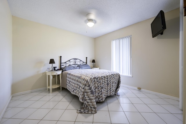 185 Bilbao St, Royal Palm Beach, FL 33411 - bedroom with baseboards, a ceiling fan, and a textured ceiling